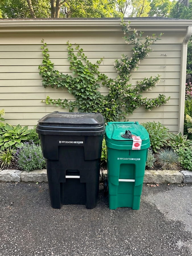 Garbage cans on a Waterloo Region curb ready for collection